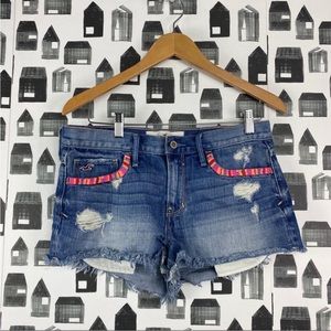 Hollister / denim jean shorts / distressed / embroidery pocket detail size 29